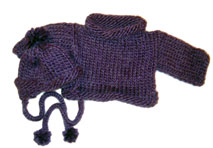 sweater and earflap hat